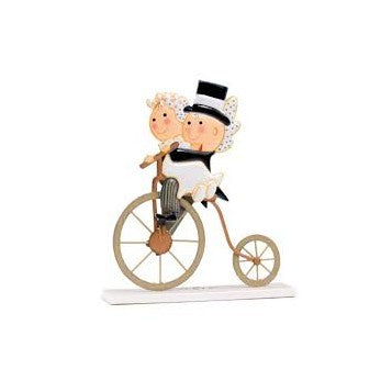 NOVIOS METAL EN BICICLETA ANTIGUA